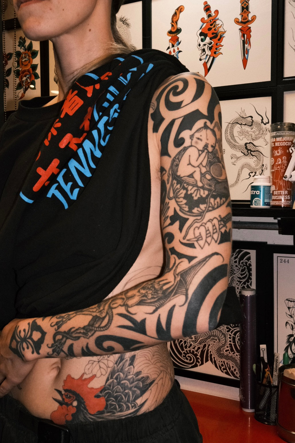 a background of borneo tribal tattooing making a full sleeve