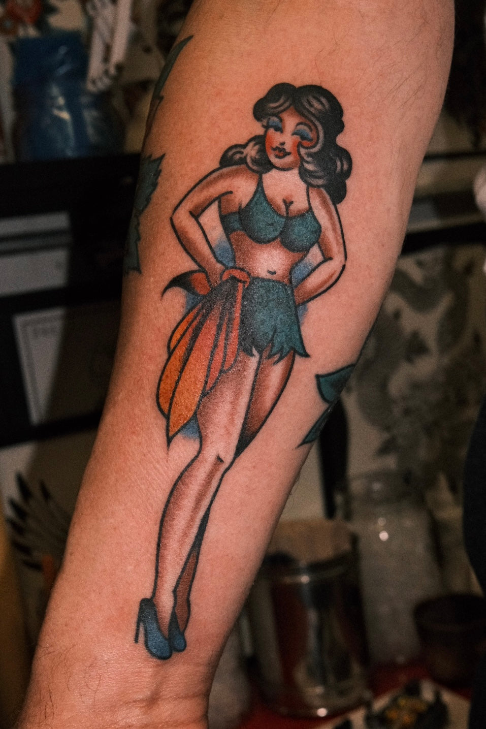 Bold American traditional classic pin up girl tattoo in colour. Done in London by jake cordal at frith street tattoo